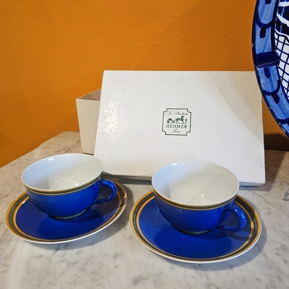 2 Vintage Hermes blue/gold/green porcelain tea cups & saucers "Toucans"